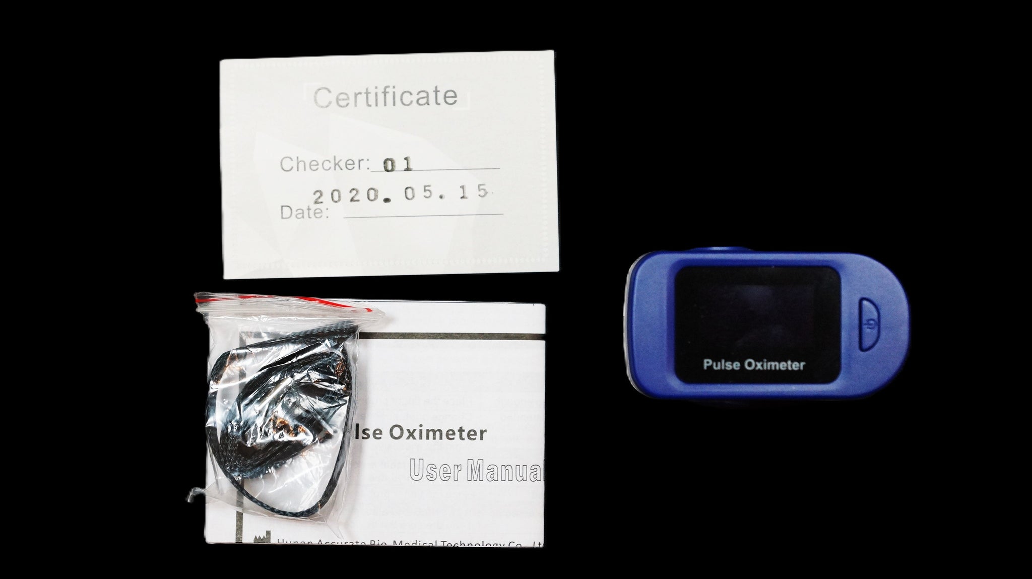 A blue pulse oximeter shown with its certificate, user manual, and accessories on a solid black background.