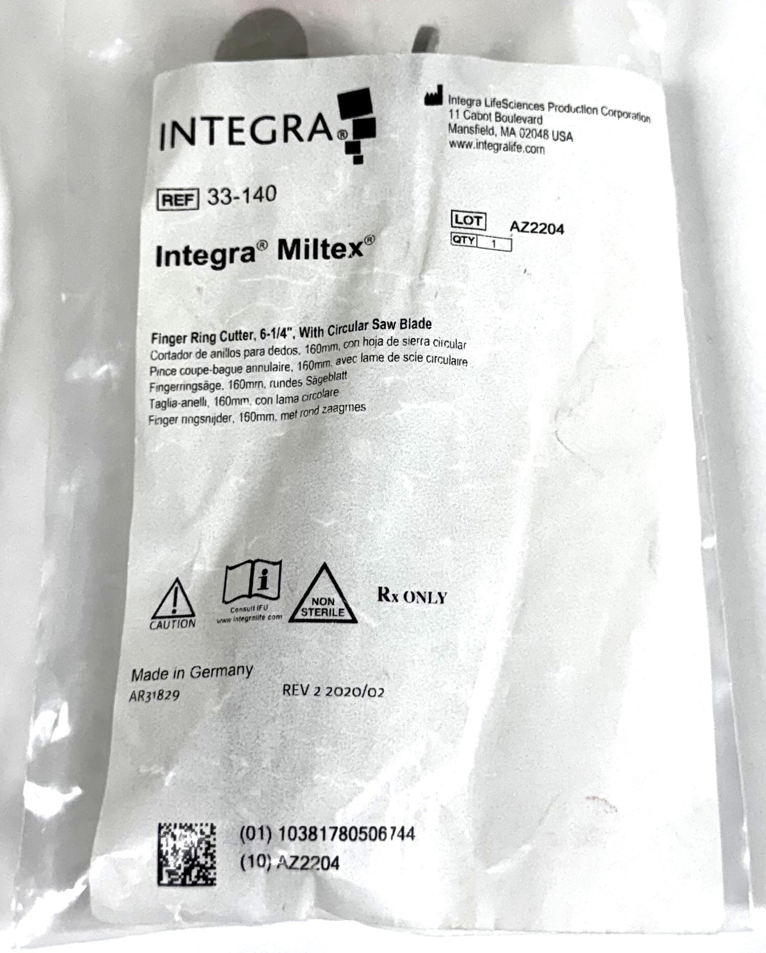 An Integra Miltex Figer Ring Cutter, 6-1/4 inches, with Circular Saw Blade, packaged in a clear plastic bag with a white paper label. The label displays product details, reference number 33-140, and manufacturer information for Integra LifeSciences.